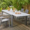SIENA GARDEN Gomera II/Kingston Esstischgarnitur, Matt Graphit/grau/wood Look, Alu/Teak/Keramik/Texfabric, Tisch 220/340x108 Cm, 6 Stapelsessel